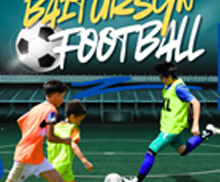 Students playing football at school